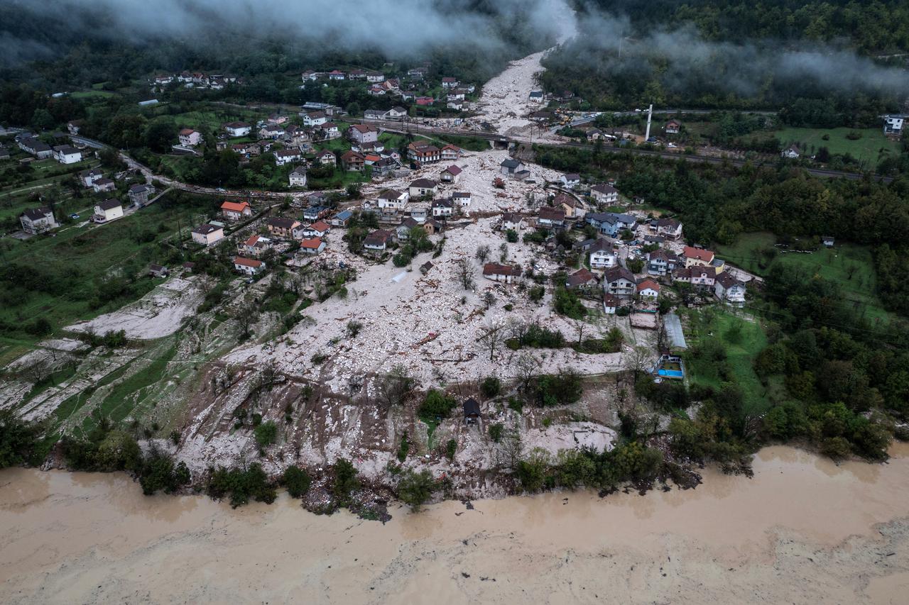 A drone view shows a flooded residential area in Donja Jablanica