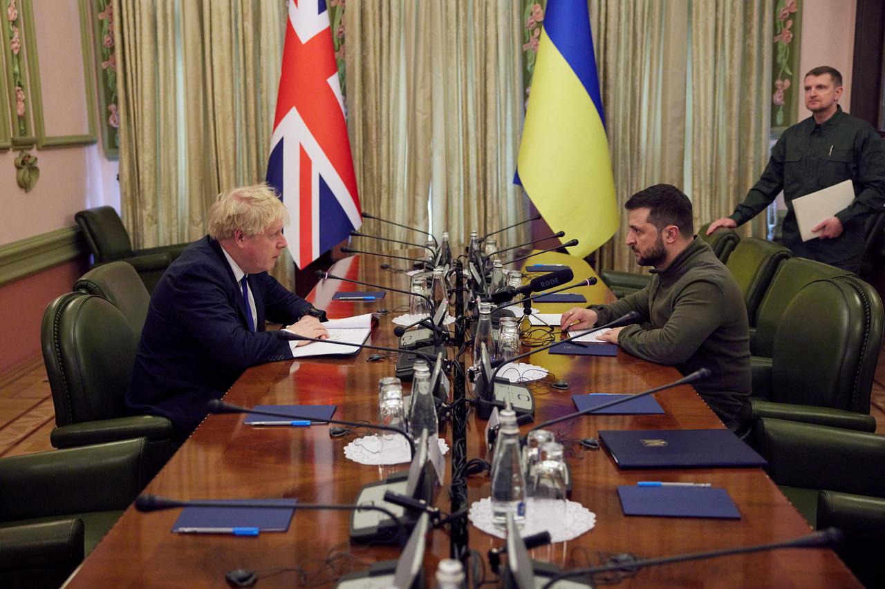 Ukraine's President Zelenskiy and British PM Johnson attend a meeting in Kyiv