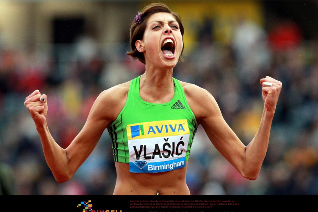 'Croatia\'s Blanka Vlasic celebrates the Women\'s high jump clearing 1.99 mtrs during the Aviva Birmingham Grand Prix at the Alexander Stadium, Birmingham. Photo: Press Association/Pixsell'