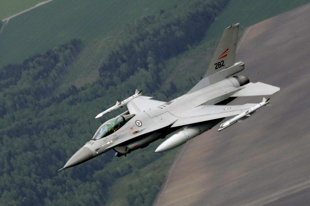FILE PHOTO: A Norwegian Air Force F-16 fighter patrols over the Baltics during a NATO air policing mission from Zokniai air base near Siauliai