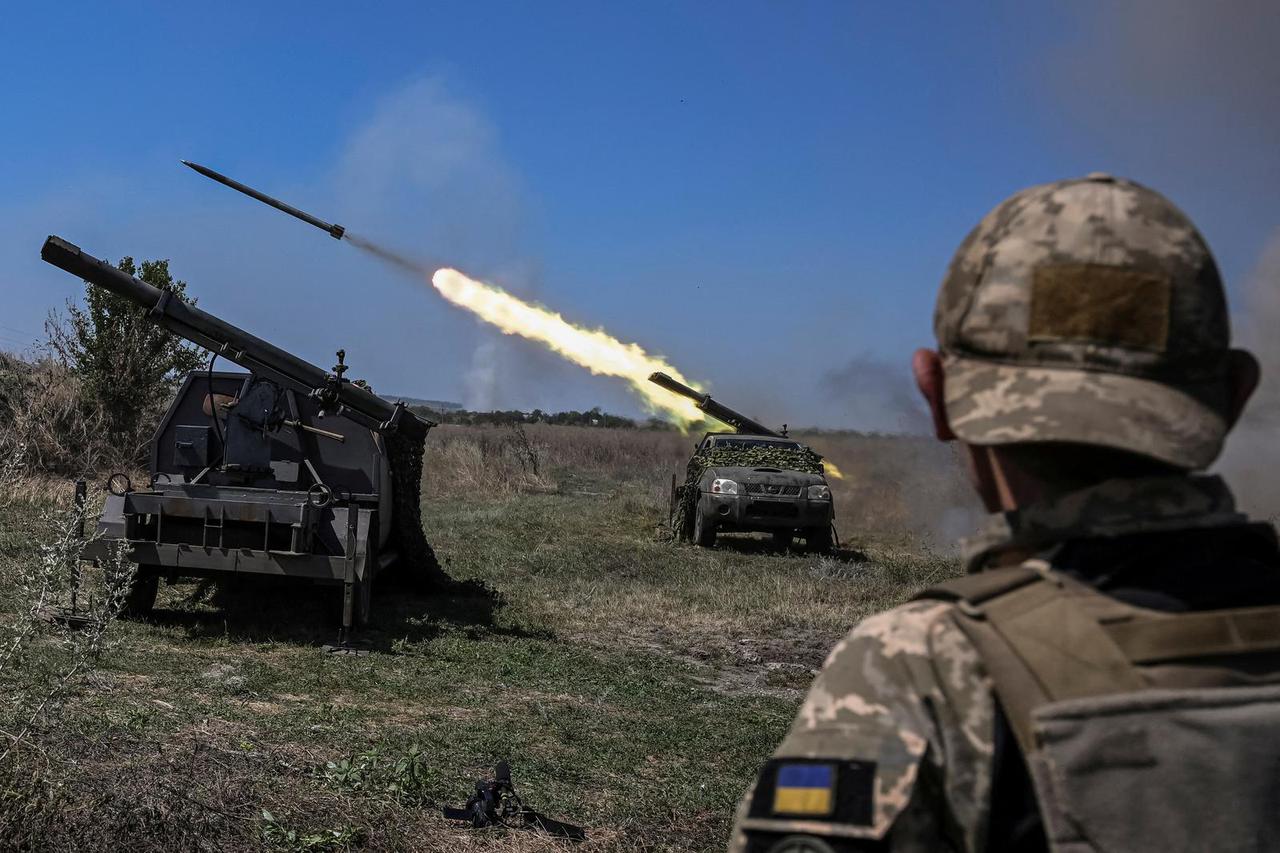 FILE PHOTO: Ukrainian servicemen fire small MLRS toward Russian troops near a front line in Zaporizhzhia region