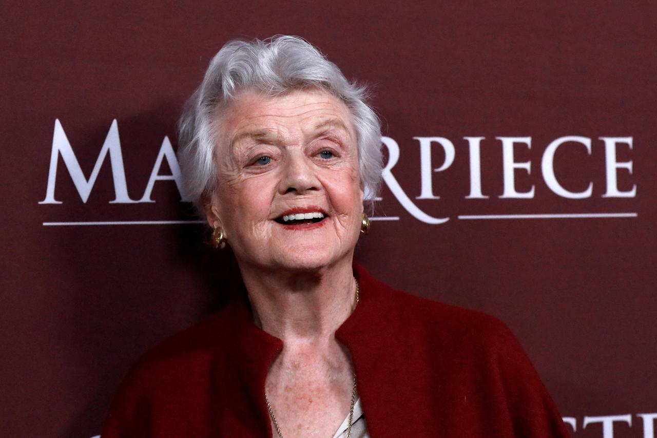 FILE PHOTO: Actor Lansbury poses at a photocall for the television series "Little Women" in Pasadena