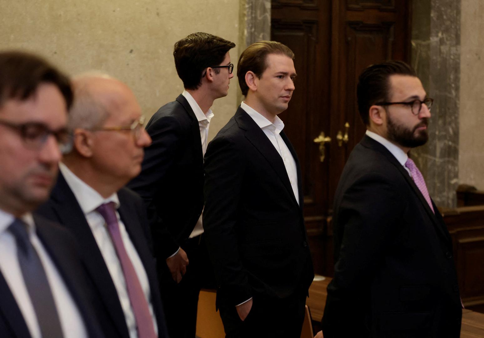 Austria's conservative former Chancellor Sebastian Kurz and Bernhard Bonelli wait for the start of their trial for perjury in a courtroom in Vienna, Austria, October 18, 2023. REUTERS/Leonhard Foeger Photo: LEONHARD FOEGER/REUTERS