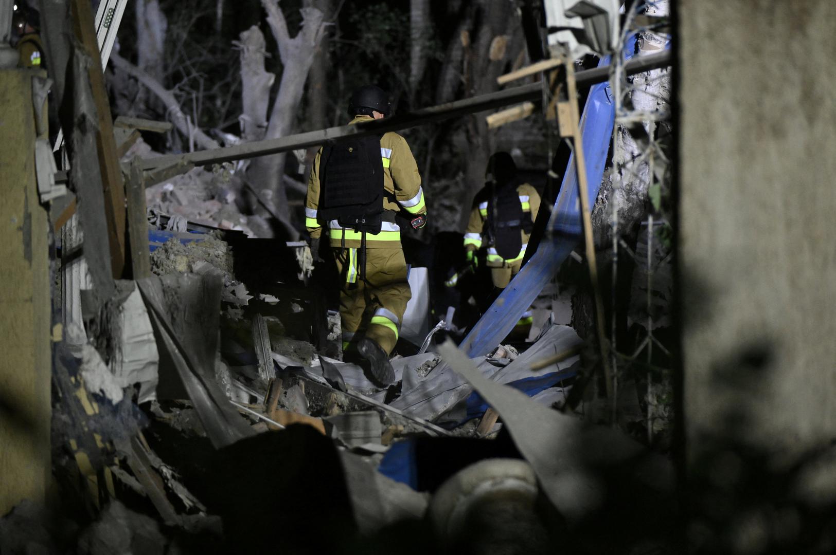 Ukrainian emergency services conduct a search and rescue operation among the rubble of a destroyed hotel following a Russian strike in the town of Kramatorsk early in the morning  on August 25, 2024, amid the Russian invasion of Ukraine. A nighttime Russian strike on a hotel in the eastern Ukrainian city of Kramatorsk wounded two journalists, while a third was missing in the rubble, authorities said Sunday. Vadym Filashkin, head of the Donetsk regional government, said the journalists were British, US and Ukrainian nationals and that a search operation was underway for the missing journalist.      GENYA SAVILOV/Pool via REUTERS Photo: GENYA SAVILOV/REUTERS