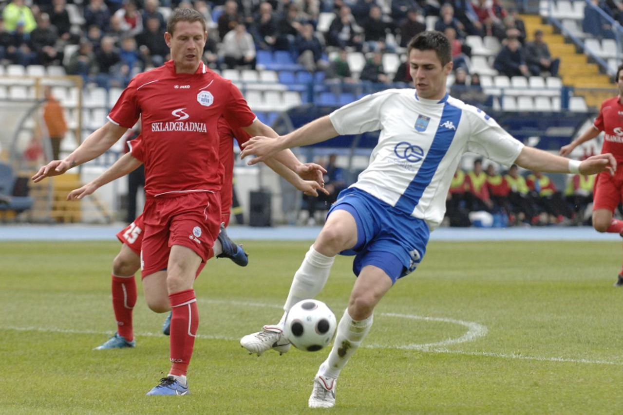 '16.04.2011., Osijek - 1. HNL, 25. kolo, NK Osijek - RNK Split.Ivica Krizanac i Josip Barisic Photo: Davor Javorovic/PIXSELL'