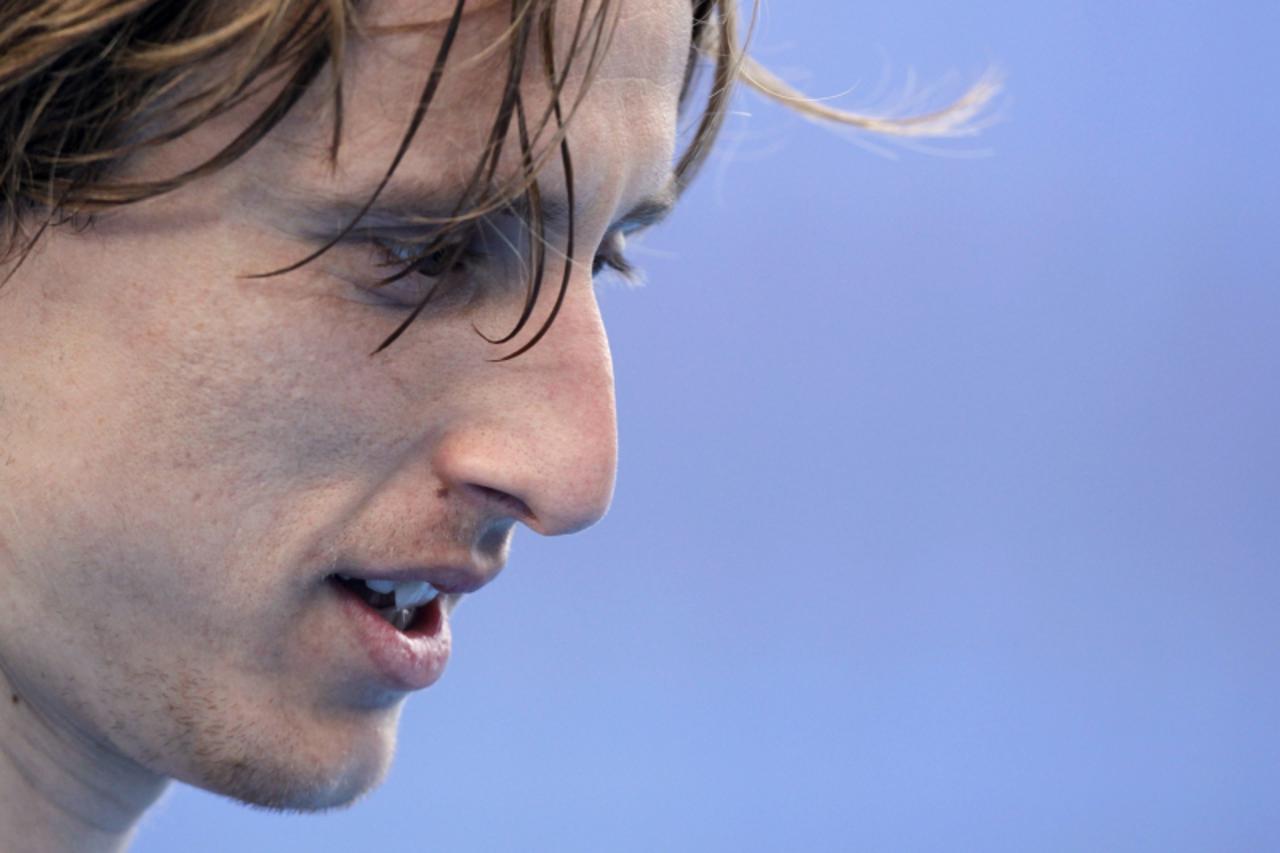 'Croatia\'s national soccer team player Luka Modric leaves after a training session in preparation for the upcoming Euro 2012 soccer championship at the Maksimir stadium in Zagreb June 4, 2012. REUTER