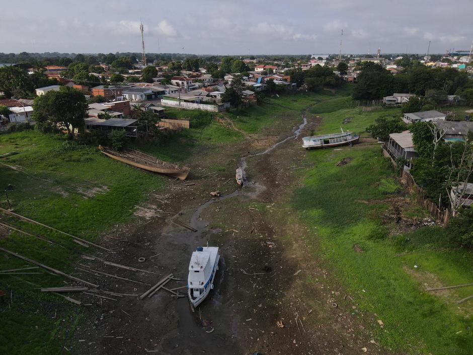 Boats are stranded by drought in Lagoa da Francesa, near the Amazonas River in Parintins