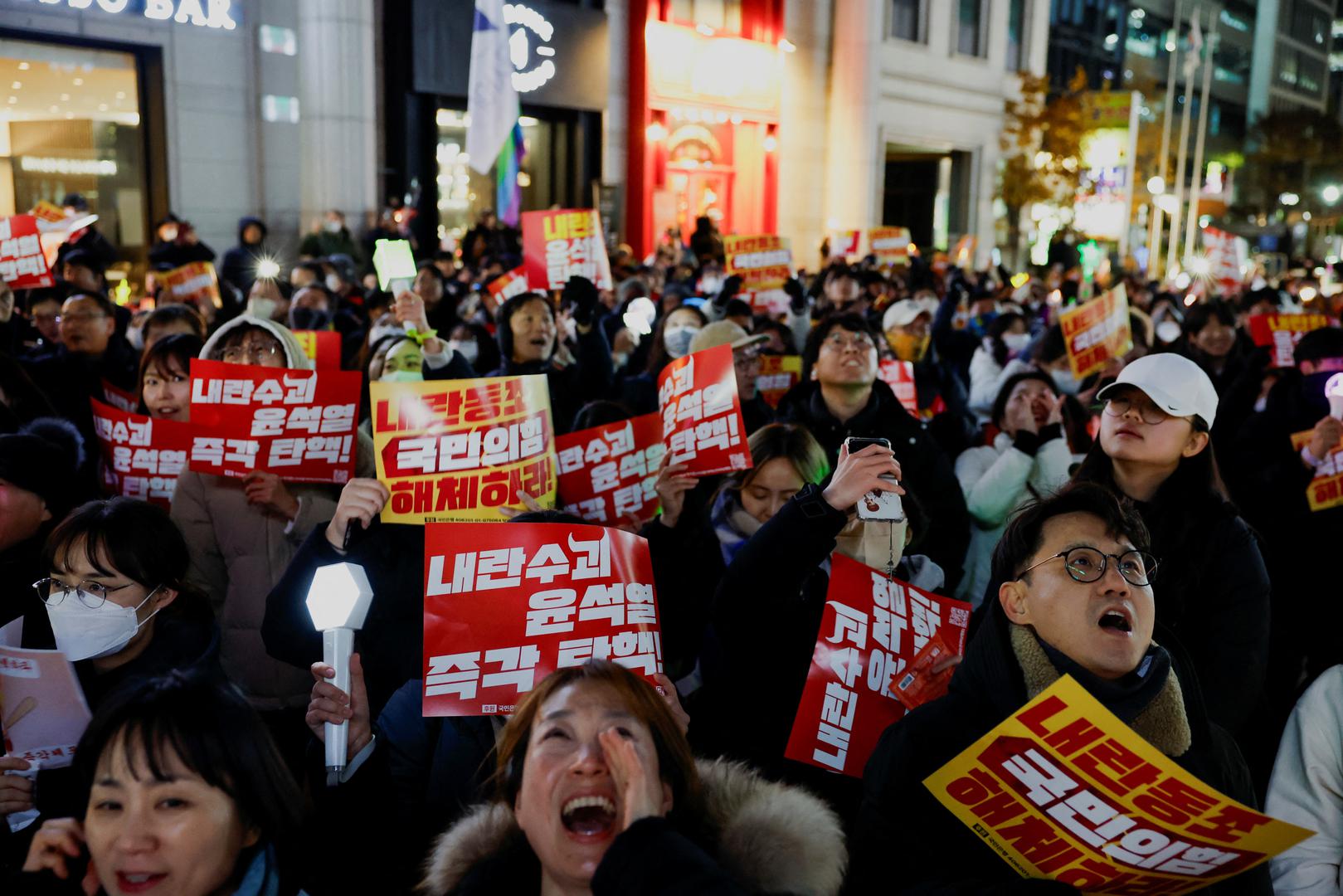 Protesters attend a rally calling for the impeachment of South Korean President Yoon Suk Yeol, who declared martial law, which was reversed hours later, in Seoul, South Korea, December 9, 2024.  REUTERS/Kim Kyung-Hoon Photo: KIM KYUNG-HOON/REUTERS