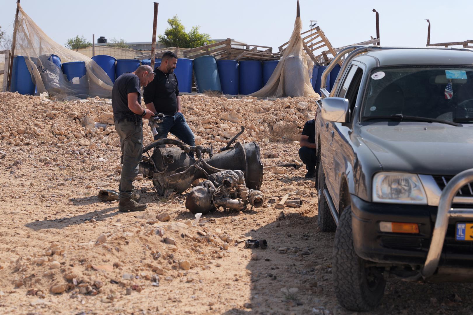 A police officer inspects the remains of a rocket booster that, according to Israeli authorities critically injured a 7-year-old girl, after Iran launched drones and missiles towards Israel, near Arad, Israel, April 14, 2024. REUTERS/Christophe?van der?Perre Photo: CHRISTOPHE VAN DER PERRE/REUTERS