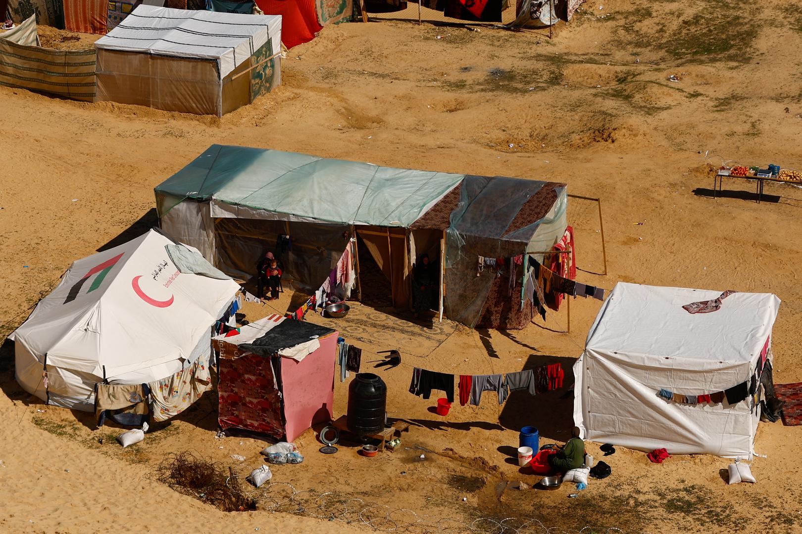 Displaced Palestinians, who fled their houses due to Israeli strikes, take shelter in a tent camp, amid the ongoing conflict between Israel and the Palestinian Islamist group Hamas, at the border with Egypt, in Rafah in the southern Gaza Strip, February 8, 2024. REUTERS/Ibraheem Abu Mustafa Photo: IBRAHEEM ABU MUSTAFA/REUTERS