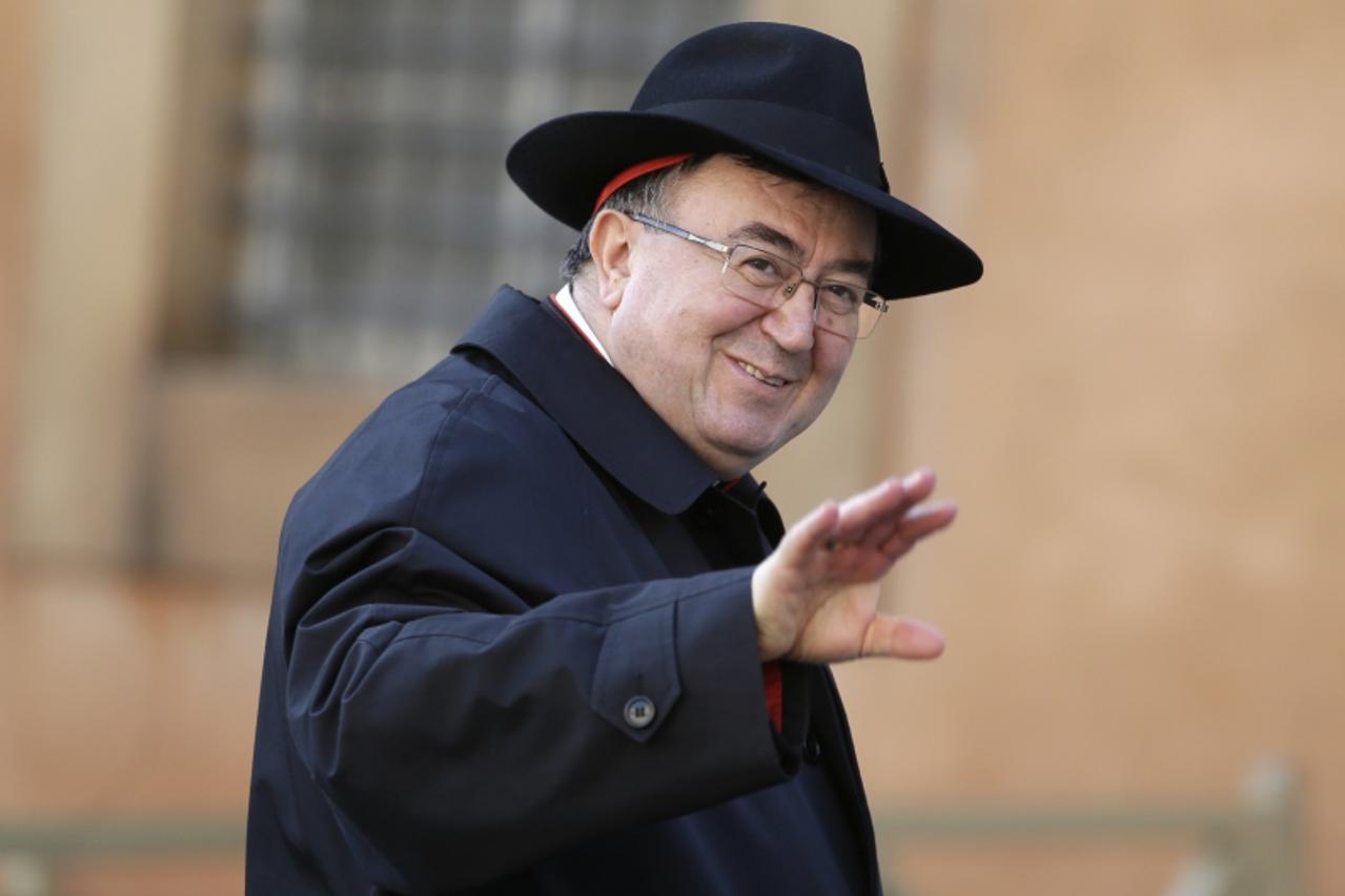 'Bosnian Cardinal Vinko Puljic arrives for a meeting at the Synod Hall in the Vatican March 4, 2013. Preparations for electing Roman Catholicism's new leader begin in earnest on Monday as the College