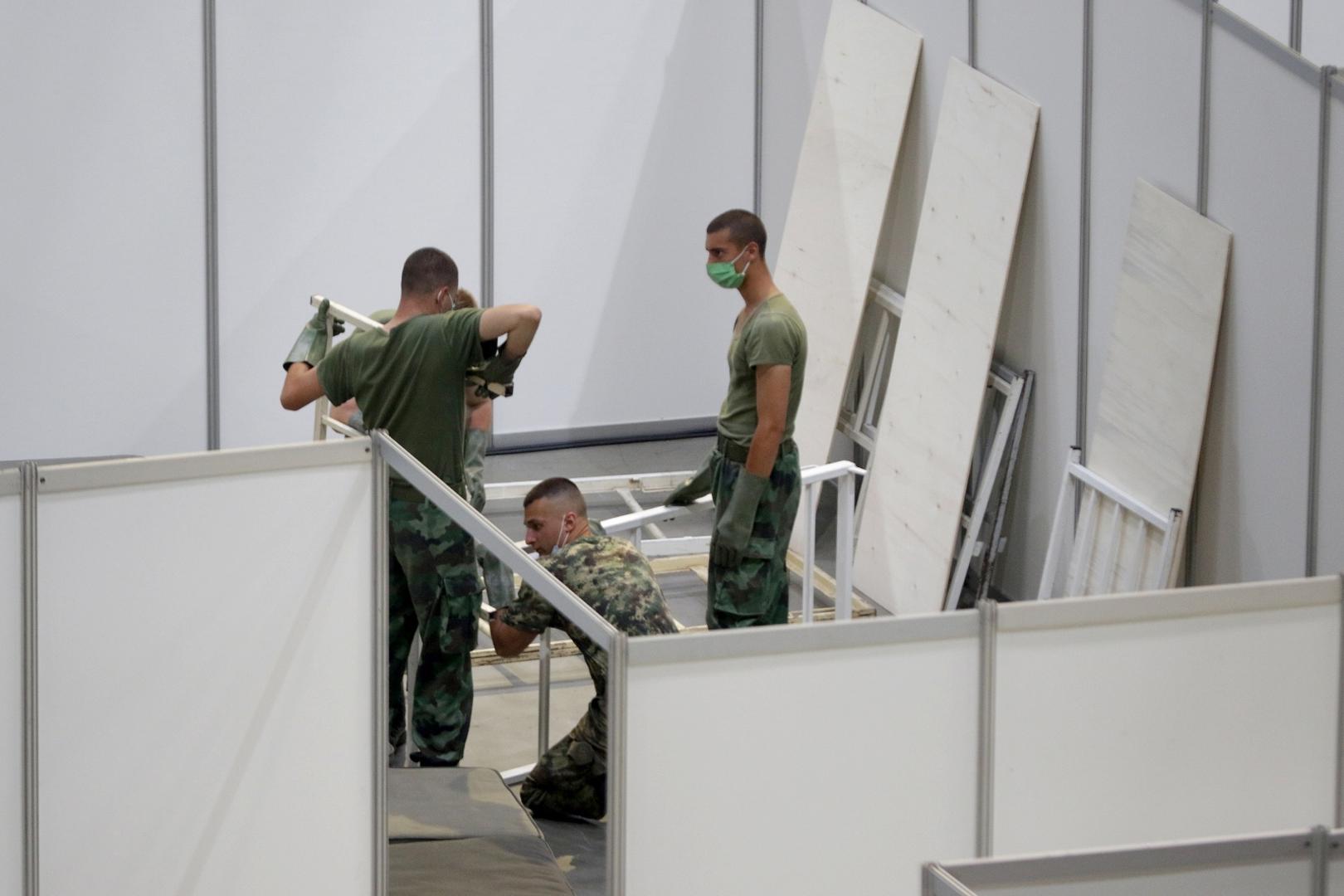 06, July, 2020, Belgrade - The Ministry of Health and the Army of the Republic of Serbia are setting up military beds in the Stark Arena to form a temporary covid hospital for people who have mild symptoms of the coronavirus. Photo: Antonio Ahel/ATAImages/PIXSELL

06, jul,2020, Beograd - Ministarstvo zdravlja i Vojska Republike Srbije namestaju vojne krevete u Stark areni za formiranje privremene kovid bolnice za ljude koji imaju blaze simtome korona virusa. Photo: Antonio Ahel/ATAImages/PIXSELL