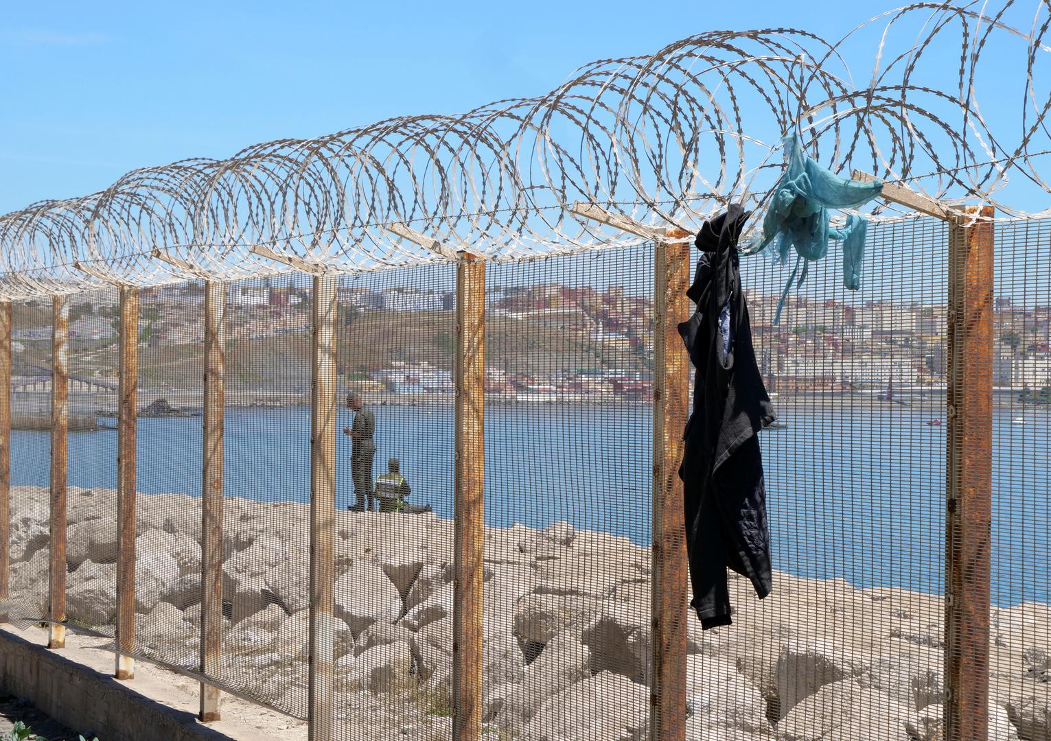 Clothes hang on a fence in Fnideq, close to the Spanish enclave Ceuta Clothes hang on a fence in Fnideq, close to the Spanish enclave Ceuta, in Morocco, May 19, 2021. REUTERS/Shereen Talaat SHEREEN TALAAT