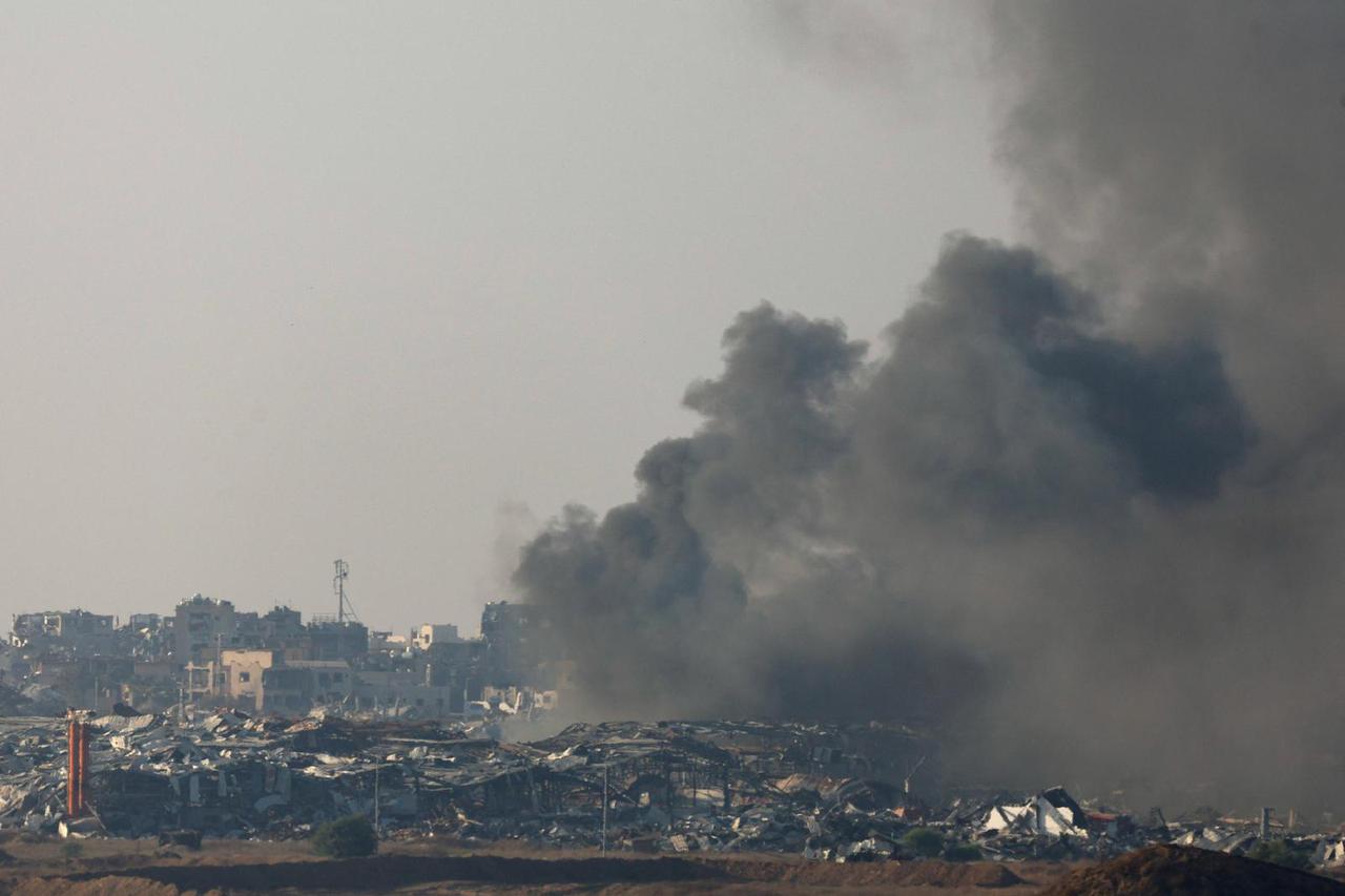Smoke rises from Gaza, amid the Israel-Hamas conflict, as seen from Israel