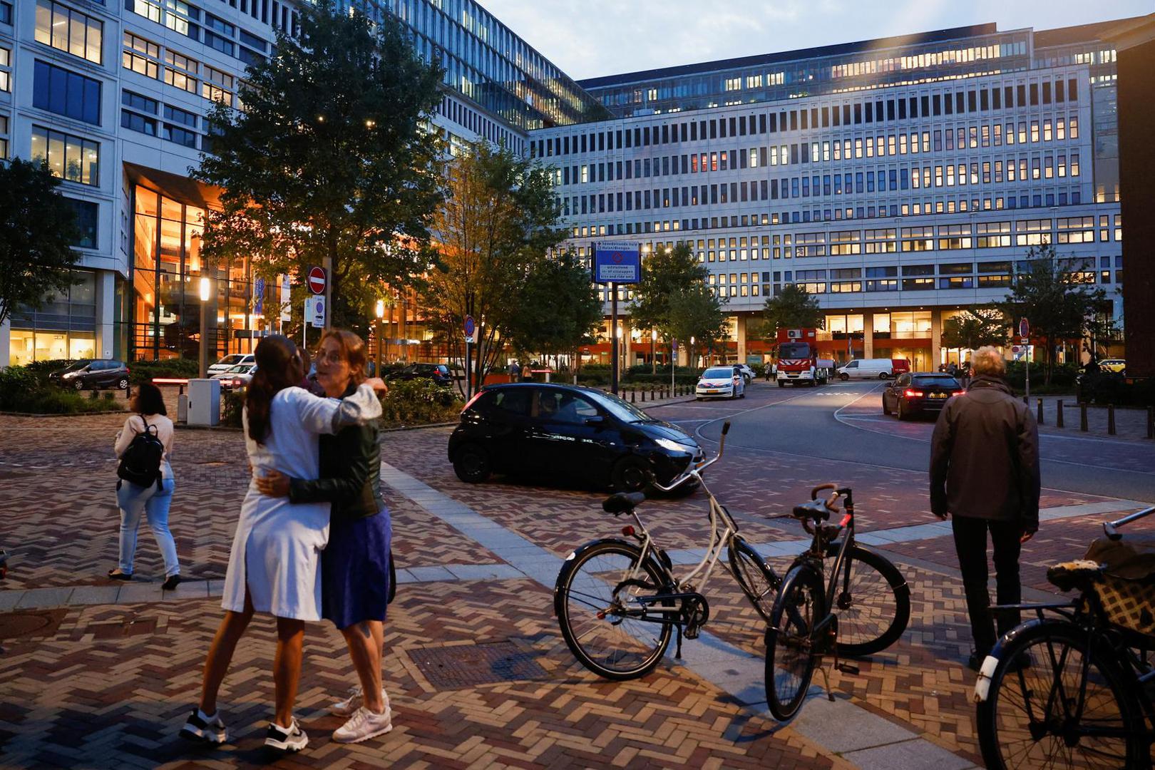 People stand near the medical center, after Dutch police arrested a suspect after a shooting in Rotterdam, Netherlands, September 28, 2023. REUTERS/Piroschka van de Wouw Photo: Piroschka van de Wouw/REUTERS