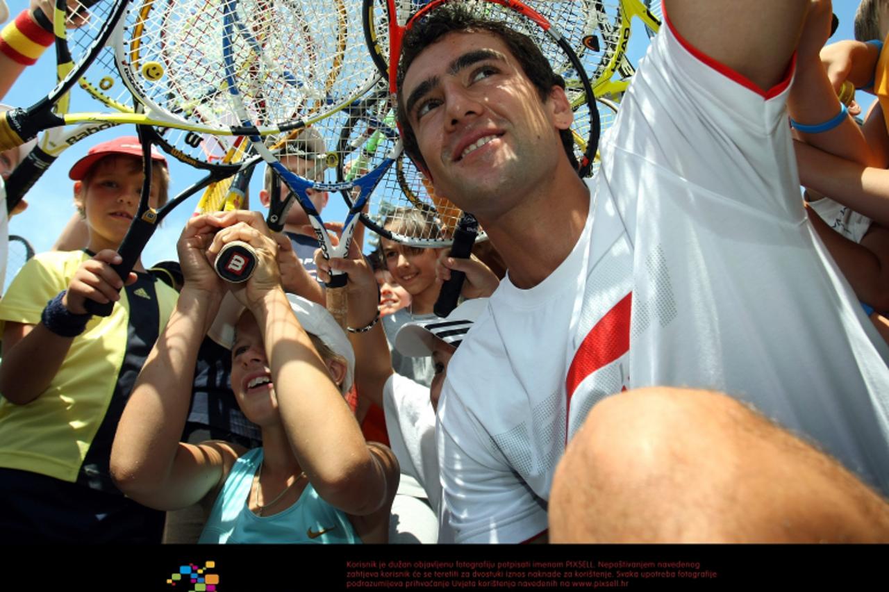 '27.07.2011., Stella Maris, Umag - 22. Studena Croatia Open Umag, INA Kids Week powered by Babolat - zabavni program za djecu. Marin Cilic.  Photo: Sanjin Strukic/PIXSELL'