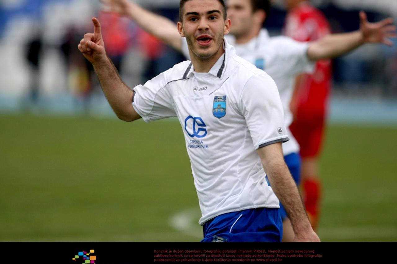 '02.04.2012. ,Osijek - Prva polufinalna utakmica hrvatskog nogometnog kupa izmedju NK Osijeka i NK Cibalije. Anton Maglica slavi postignuti gol. Photo: Davor Javorovic/PIXSELL'