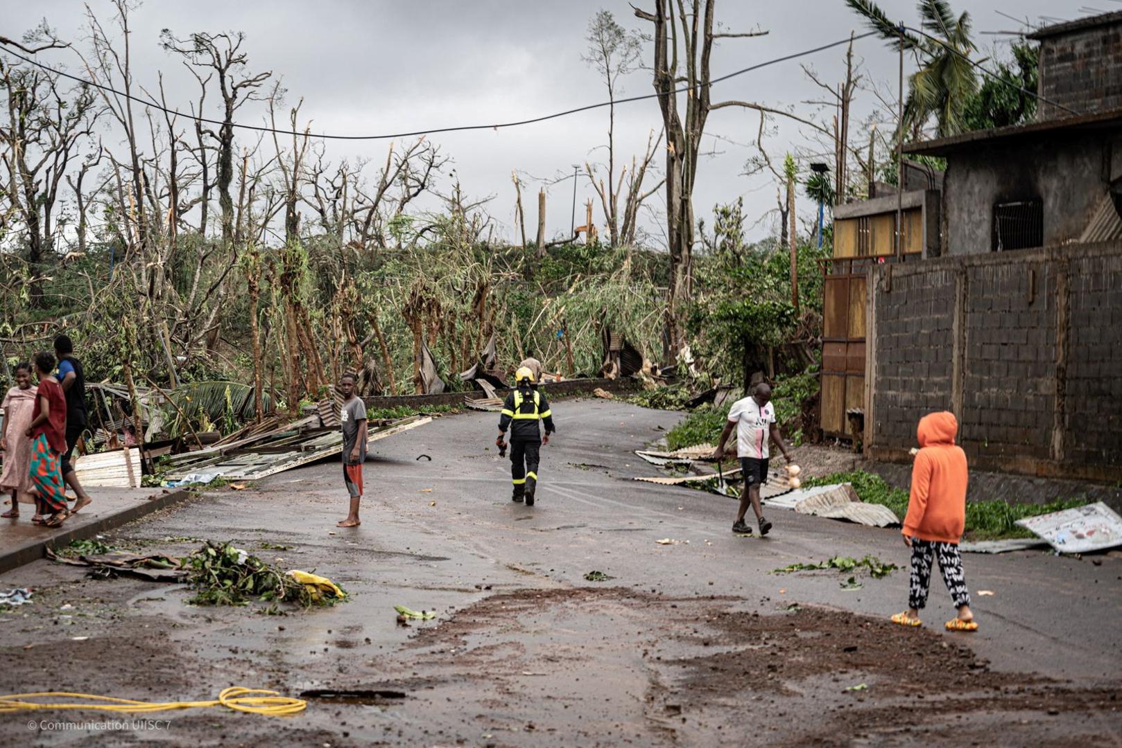 A rescue worker walks near damaged property in storm-hit Mayotte, France, in this handout image obtained by Reuters on December 16, 2024. UIISC7/Securite Civile/Handout via REUTERS    THIS IMAGE HAS BEEN SUPPLIED BY A THIRD PARTY. NO RESALES. NO ARCHIVES Photo: UIISC7/Securite Civile/REUTERS