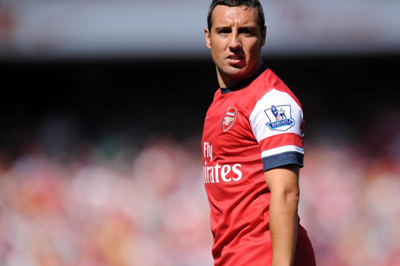 'Arsenal\'s Spanish midfielder Santi Cazorla looks on during the English Premier League football match between Arsenal and Sunderland at The Emirates Stadium in north London, England on August 18, 201