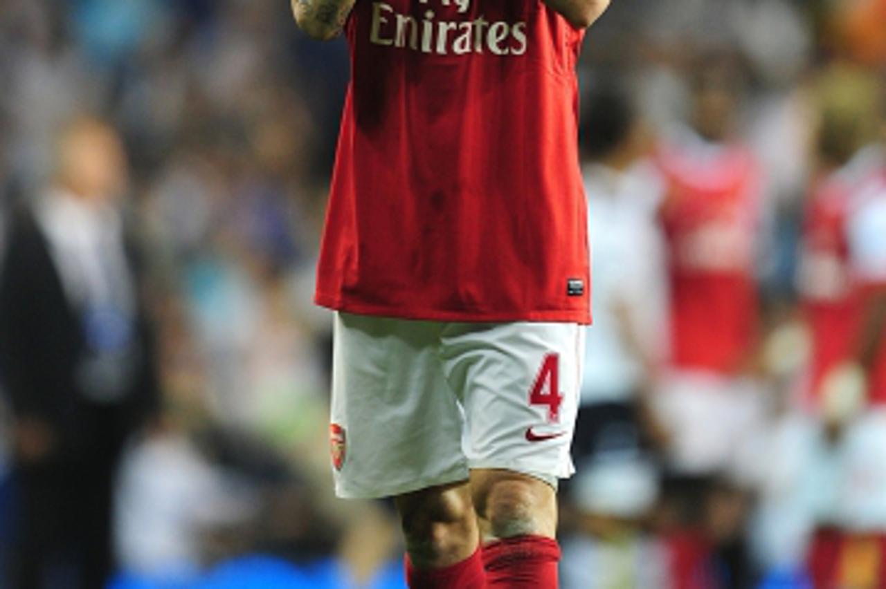 'Arsenal\'s Francesc Fabregas applauds the travelling fans after the final whistle Photo: Press Association/Pixsell'