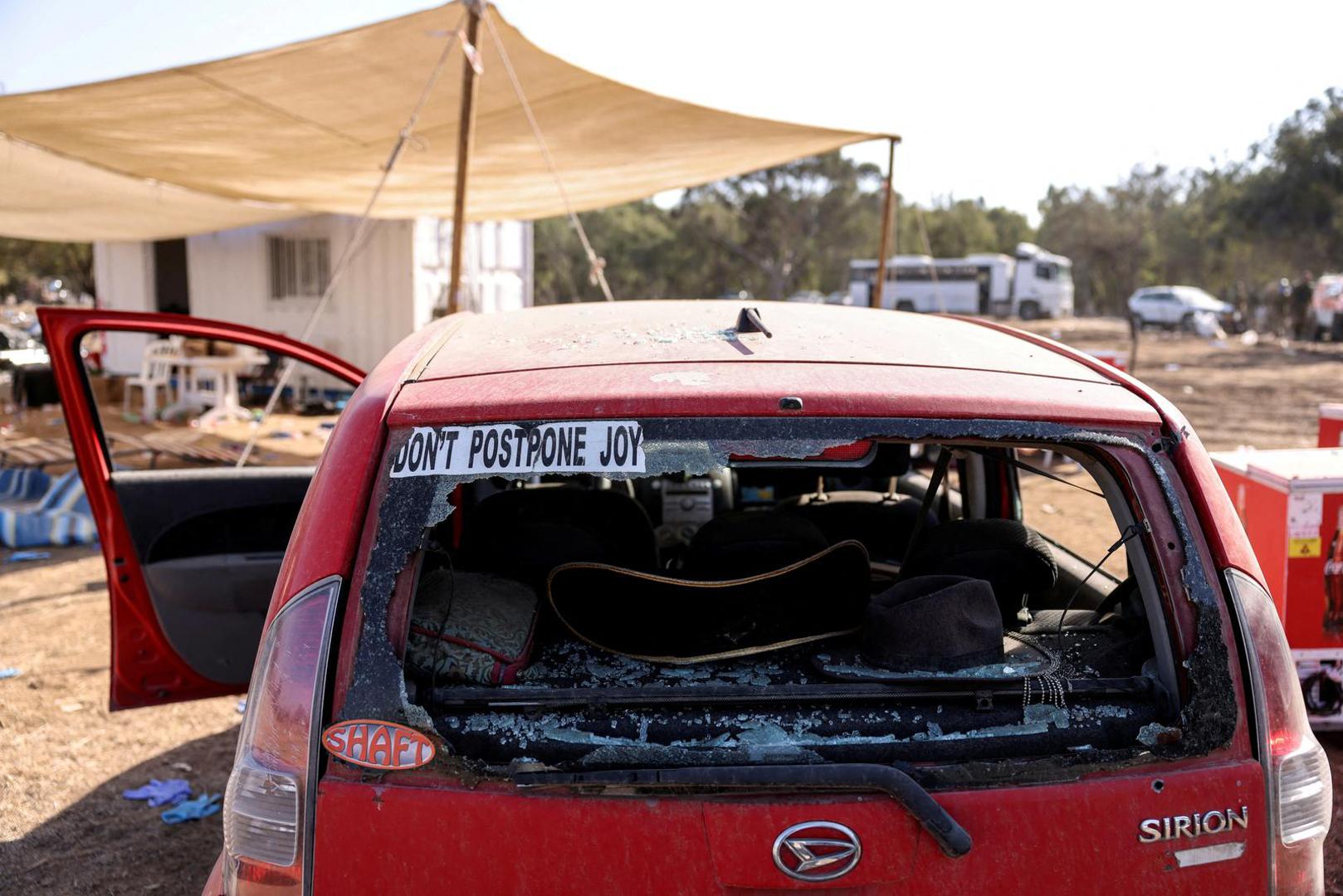 A damaged car left at the site of an attack on the Nova Festival by Hamas gunmen from Gaza, near Israel's border with the Gaza Strip, in southern Israel, October 12, 2023. REUTERS/Ronen Zvulun     TPX IMAGES OF THE DAY Photo: RONEN ZVULUN/REUTERS