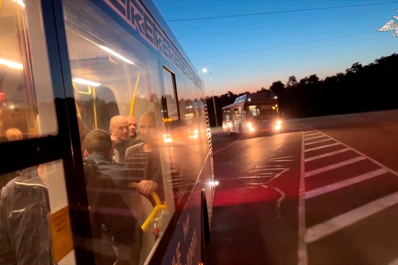 A still image from a video shows what it said to be captured Russian service personnel in a bus following the latest exchange of prisoners of war at an unknown location in the course of Russia-Ukraine conflict