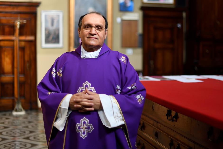 Italy small town priest who dealt with death on an industrial scale, one year on