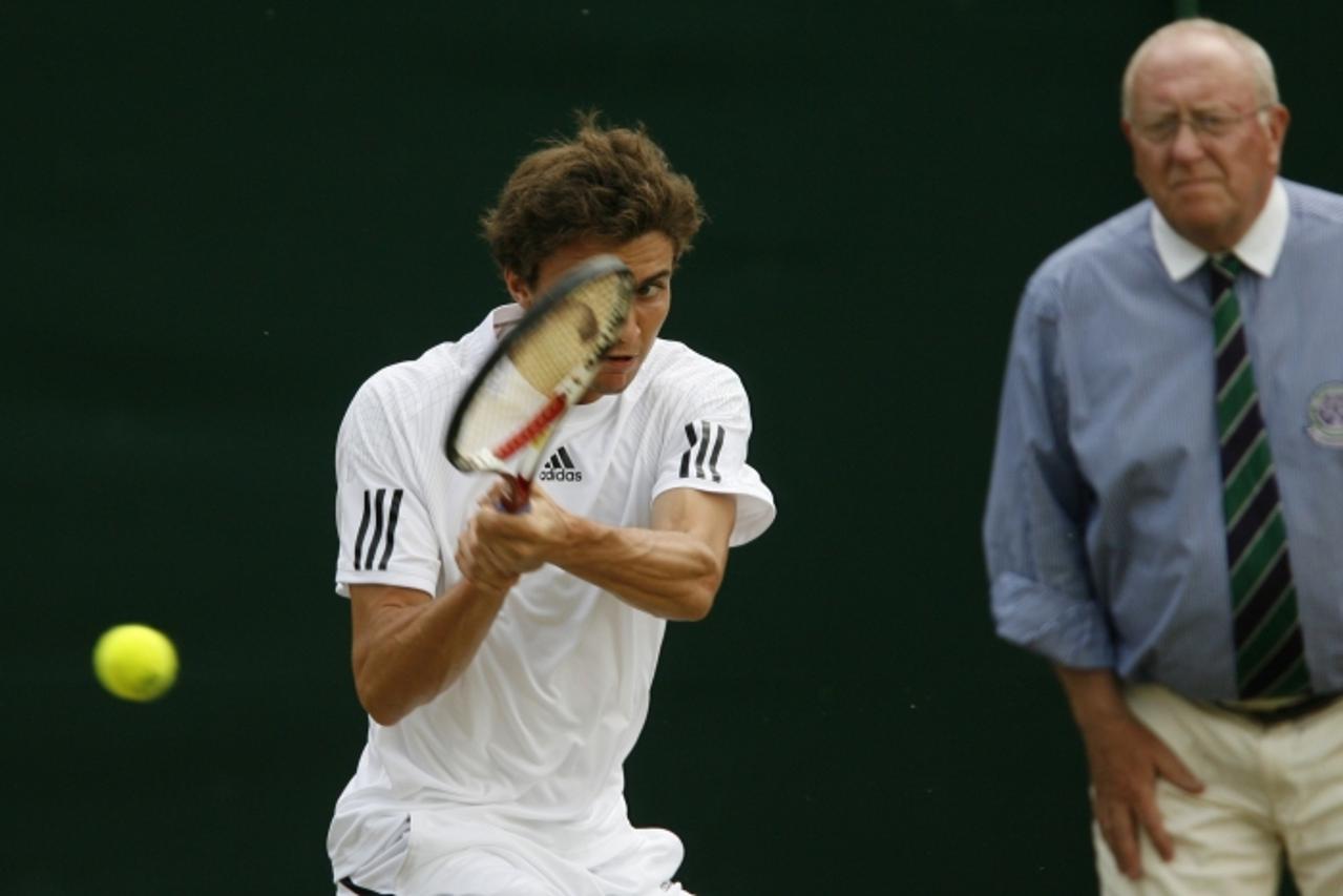 Gilles Simon  