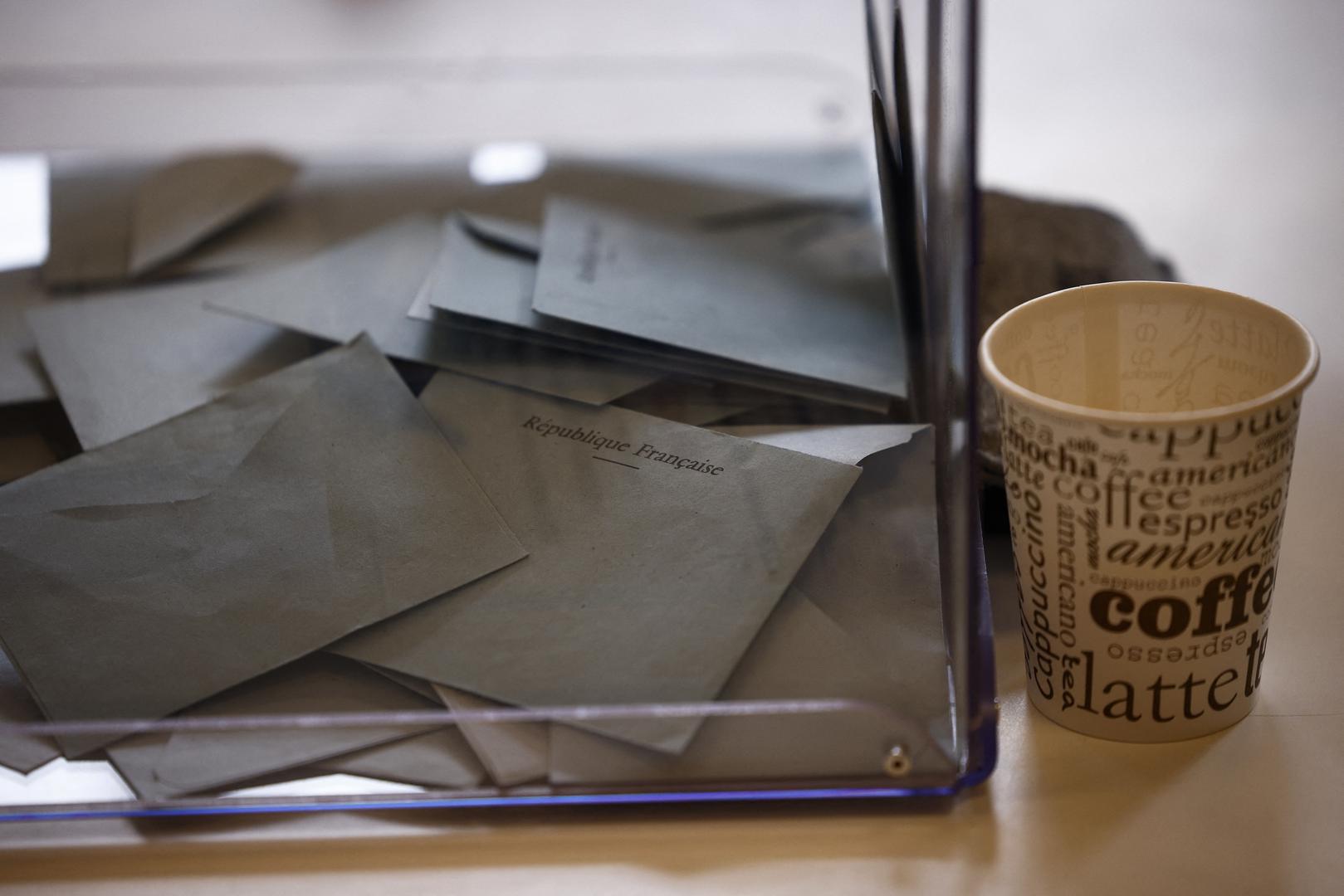 Envelopes lie in a ballot box in the second round of the early French parliamentary elections, at a polling station in Vanves near Paris, France, July 7, 2024. REUTERS/Guglielmo Mangiapane Photo: GUGLIELMO MANGIAPANE/REUTERS