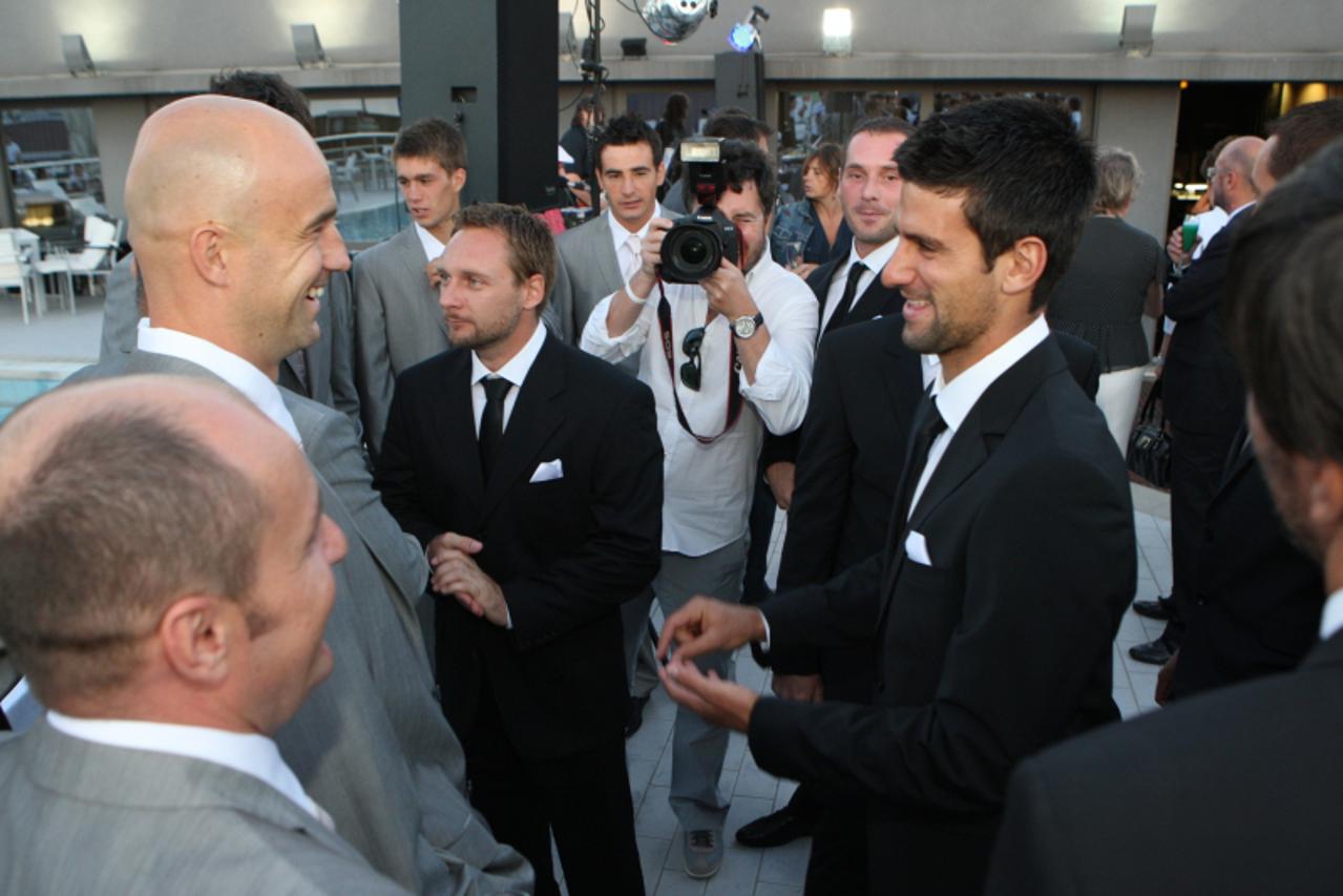 '07.07.2010.Split. Ivan Ljubicic i Novak Djokovic  sa suigracima na svecanoj veceri u restoranu Sky  koja se odrzava  povodu susreta Davis Cupa izmedju Hrvatske i Srbije  Photo: Ivo Cagalj/PIXSELL'