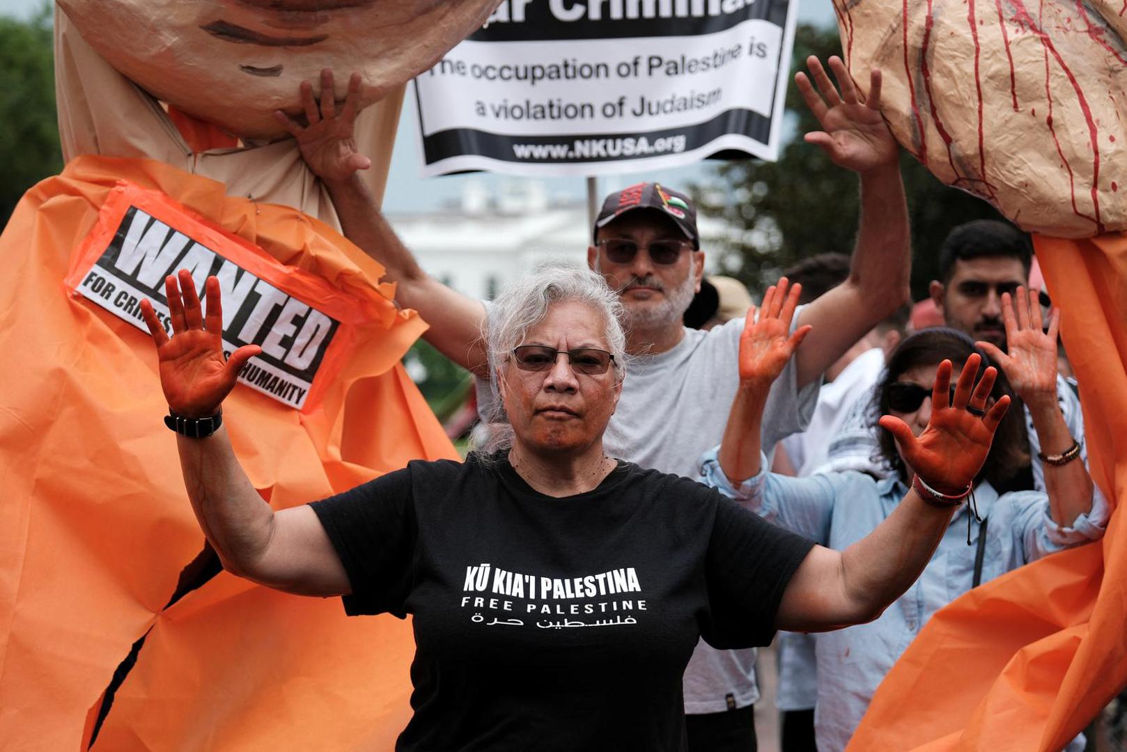 Demonstrators protest during a pro-Palestinian rally, on the day Israeli Prime Minister Benjamin Netanyahu is scheduled to hold White House meetings with U.S. President Joe Biden and Vice President Kamala Harris, in Washington, D.C., U.S., July 25, 2024. REUTERS/ Michael A. McCoy Photo: MICHAEL MCCOY/REUTERS