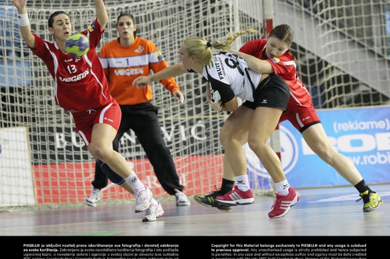 '02.02.2013., Koprivnica - Kup pobjednika kupova, 1/8 finala,  RK Podravka Vegeta - HC Vaci NKSE. Marieta Vidak, Zsofia Szondi i Vesna Milanovic Litre. Photo: Marijan Susenj/PIXSELL'