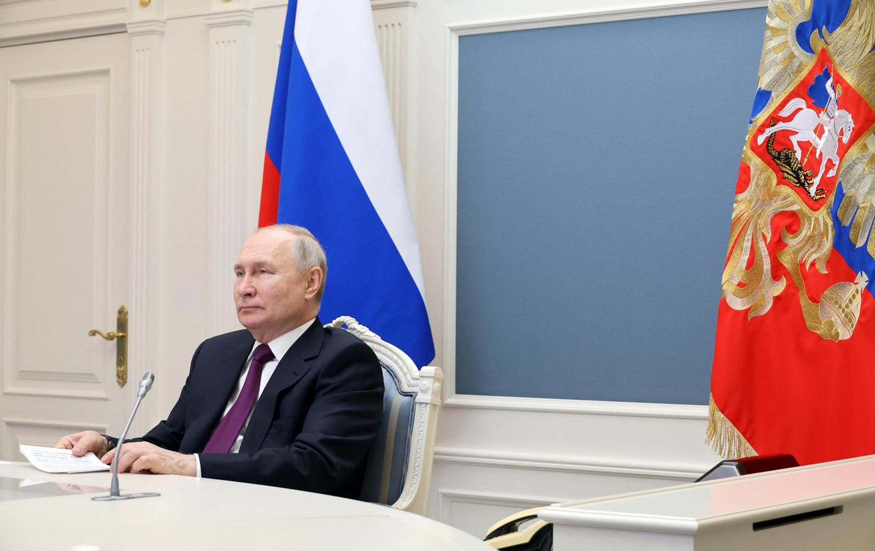 Russian President Vladimir Putin, together with Iranian President Ebrahim Raisi, takes part in the ceremony of signing an agreement on the construction of the Rasht-Astara railway, via video link at the Kremlin in Moscow, Russia May 17, 2023. Sputnik/Mikhail Klimentyev/Kremlin via REUTERS ATTENTION EDITORS - THIS IMAGE WAS PROVIDED BY A THIRD PARTY. Photo: SPUTNIK/REUTERS