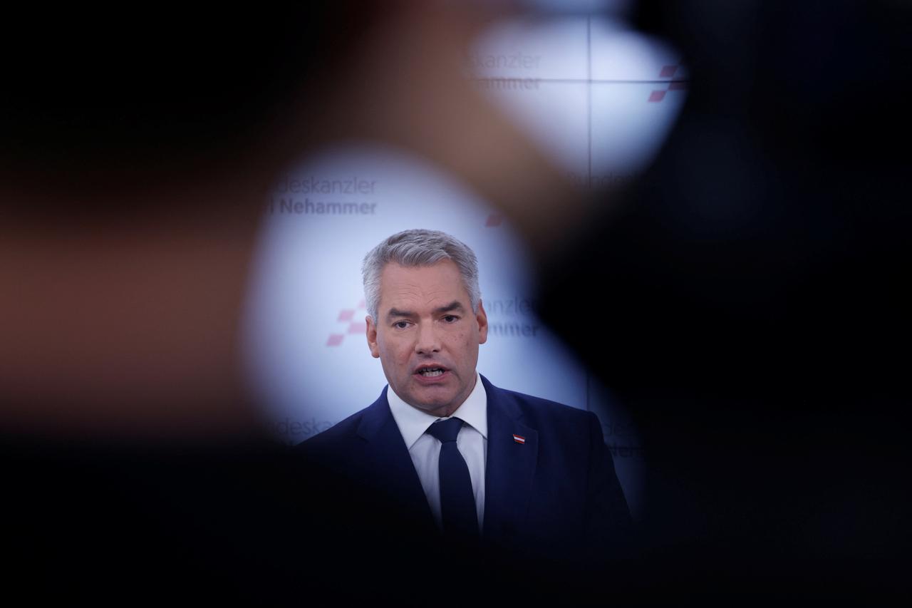 Austrian Chancellor and head of Peoples Party Karl Nehammer addresses the media in Vienna