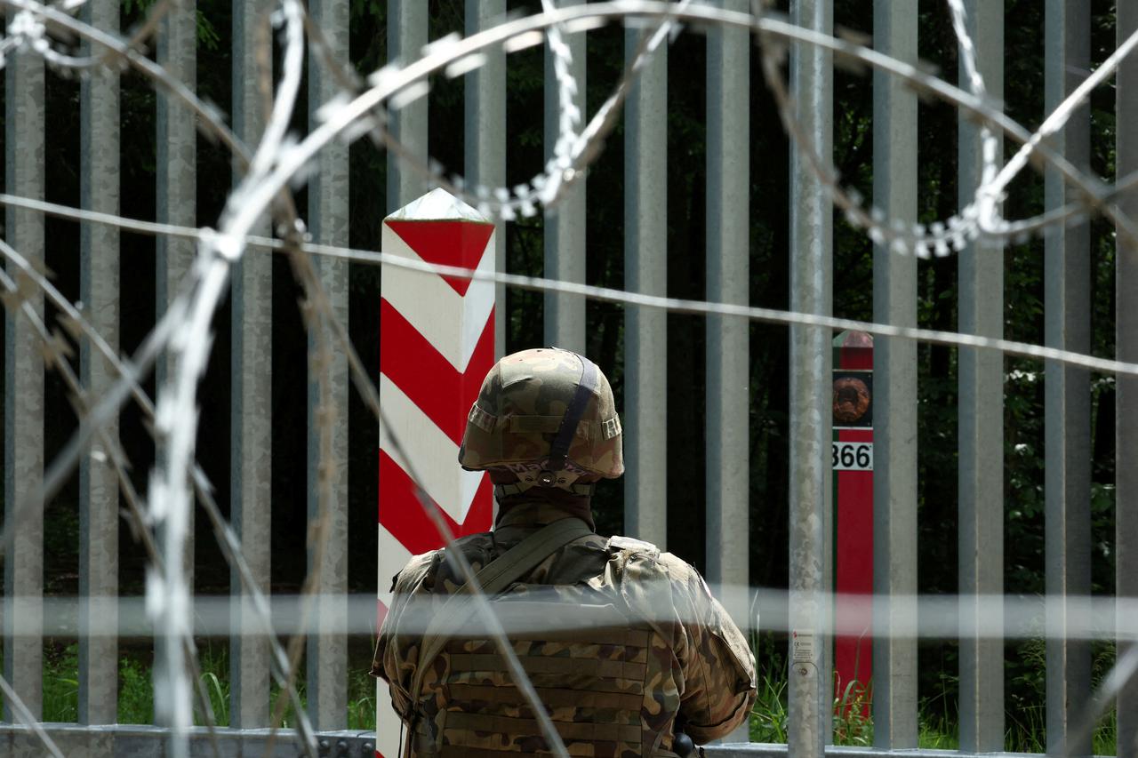 FILE PHOTO: Migrant arrivals at Belarus border prompt possible reintroduction of Poland's buffer zone