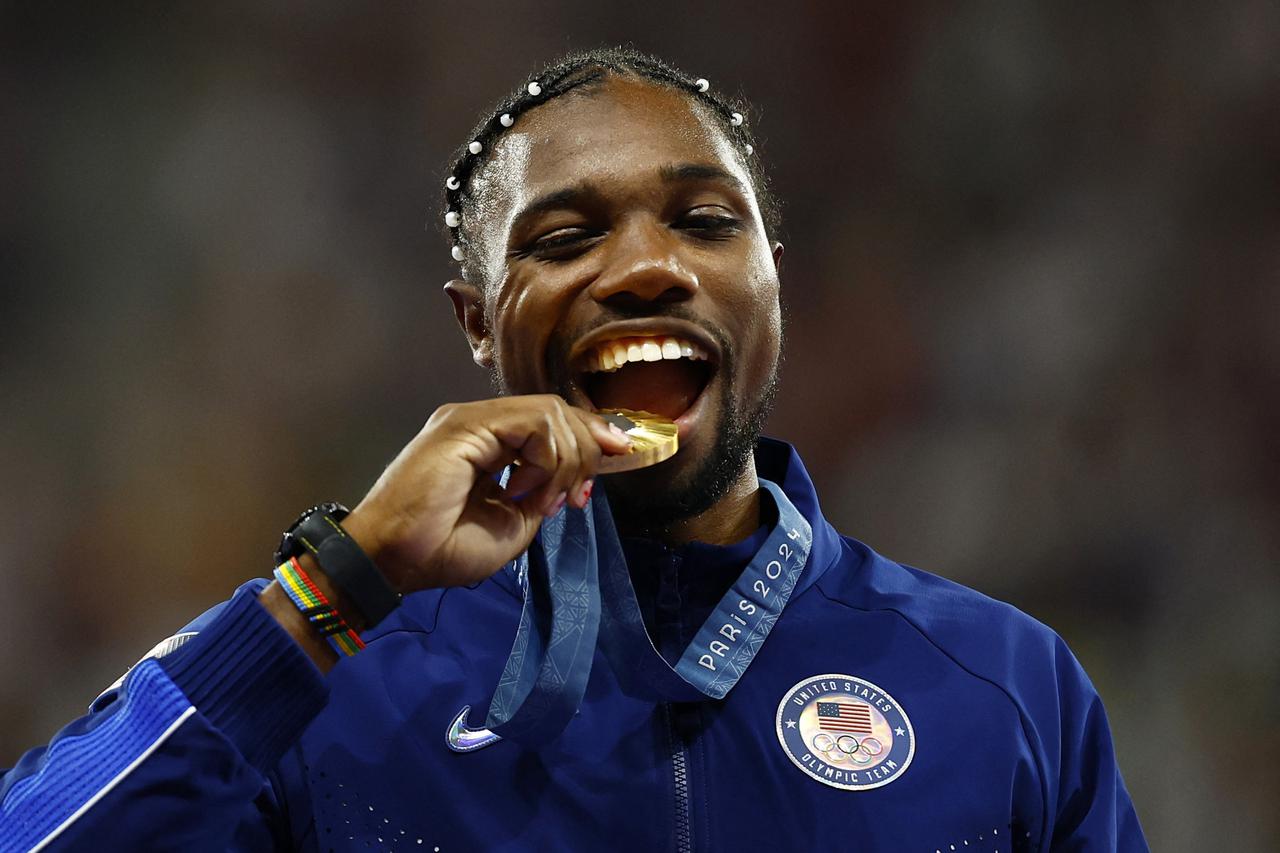 Athletics - Men's 100m Victory Ceremony