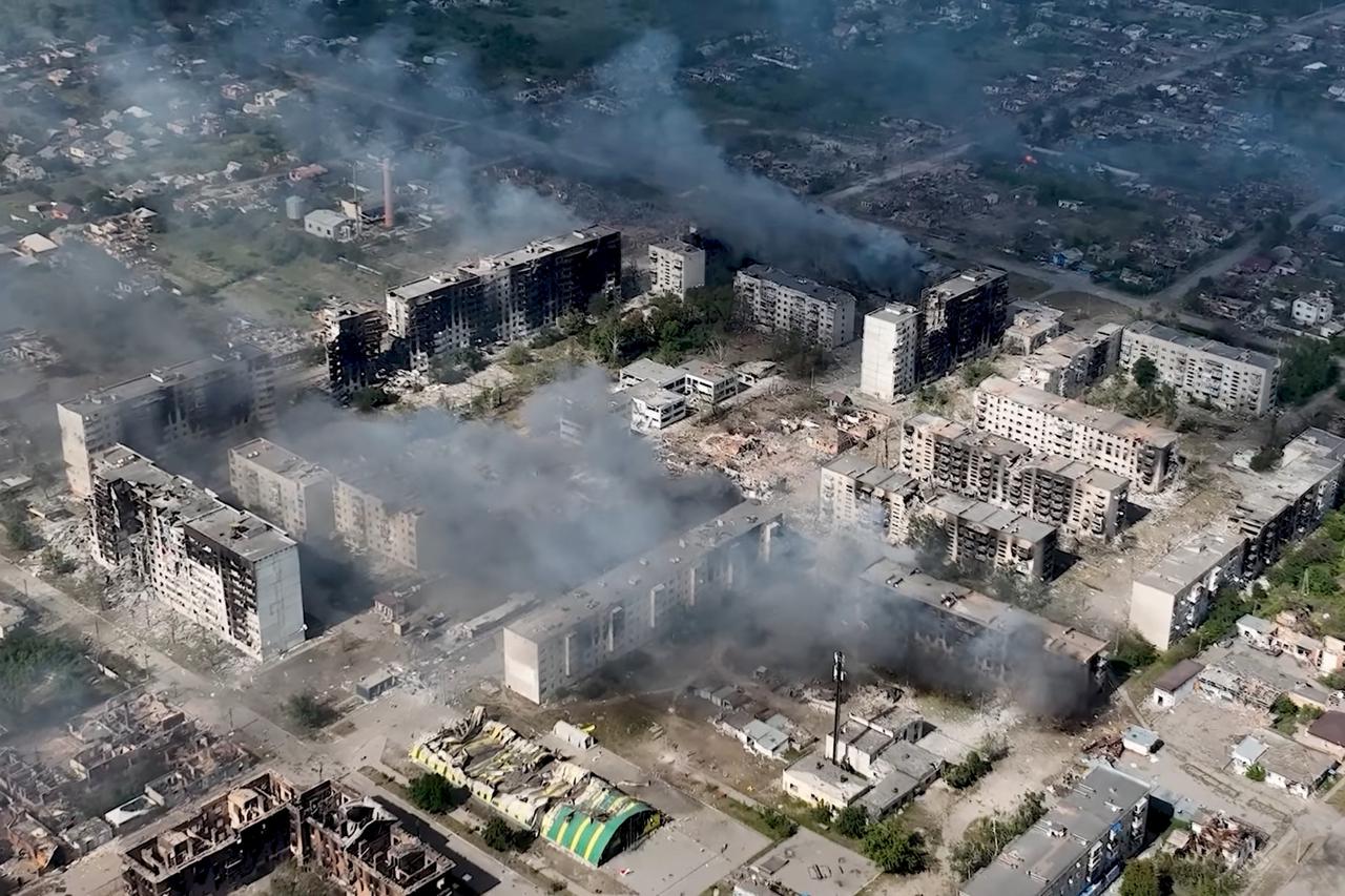 A drone view shows damaged property, in Vovchansk