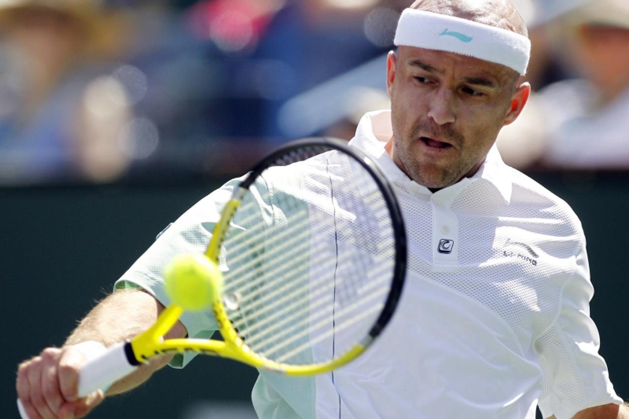 'REFILE - CORRECTING DATE   Ivan Ljubicic of Croatia returns a shot against Rafael Nadal of Spain during their match at the Indian Wells ATP tennis tournament in Indian Wells, California, March 20, 20