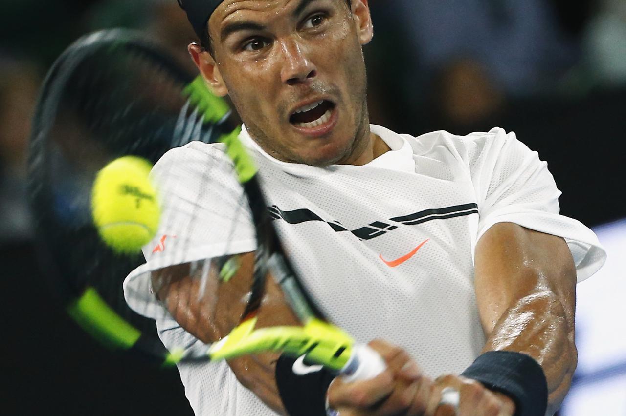 Tennis - Australian Open - Melbourne Park, Melbourne, Australia - 27/1/17 Spain's Rafael Nadal hits a shot during his Men's singles semi-final match against Bulgaria's Grigor Dimitrov. REUTERS/Thomas Peter