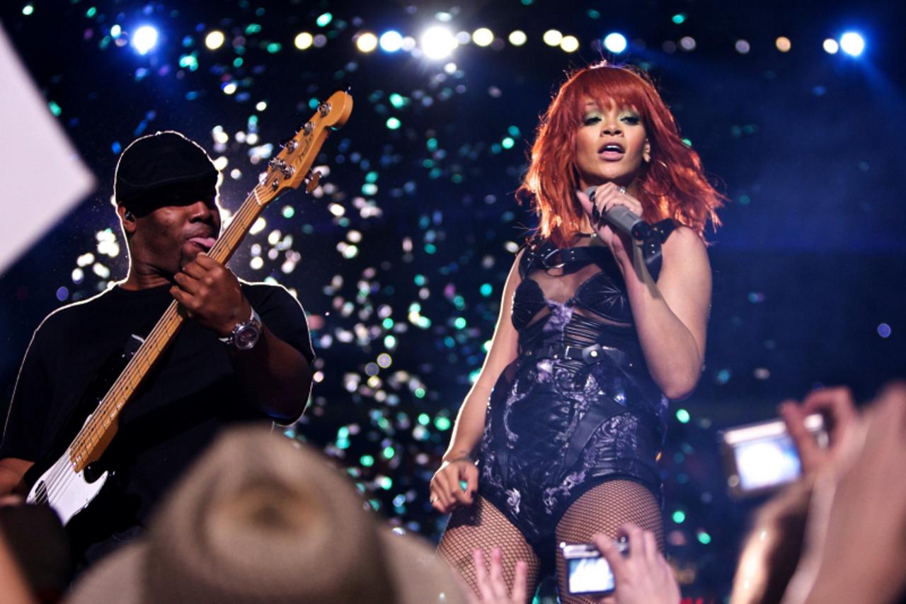 'Singer Rihanna performs during a festive concert to celebrate the 75th anniversary of Shakhtar football club the Donbass Arena in Donetsk May 14, 2011.  REUTERS/Valeriy Bilokryl  (UKRAINE - Tags: ENT