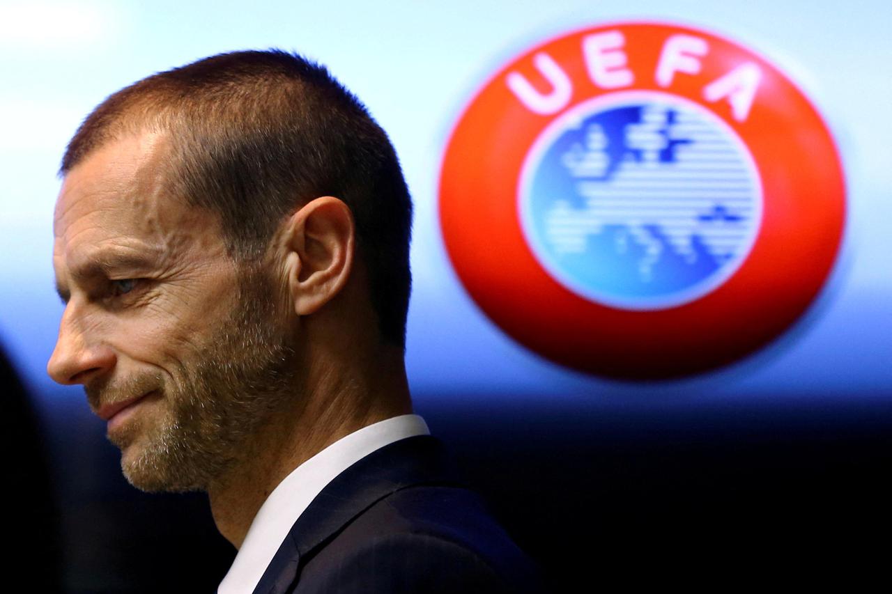 FILE PHOTO: UEFA president Aleksander Ceferin arrives at a news conference in Stara Pazova, Serbia