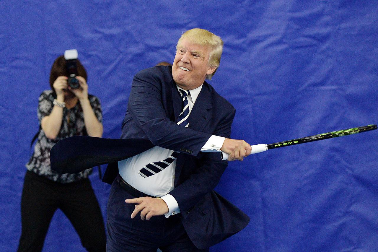 Donald Trump, and Serena Williams attend grand opening of the Trump Tennis Performance Center - VADonald Trump, chairman of The Trump Organization plays tennis with tennis champion Serena Williams during the grand opening of the Tennis Performance Center 