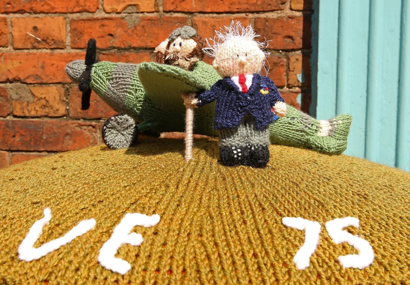 VE Day 75th Anniversary A knitted post box cap featuring Captain Tom and a Spitfire pilot in preparation VE Day Syston, Leicestershire Nigel French  Photo: PA Images/PIXSELL