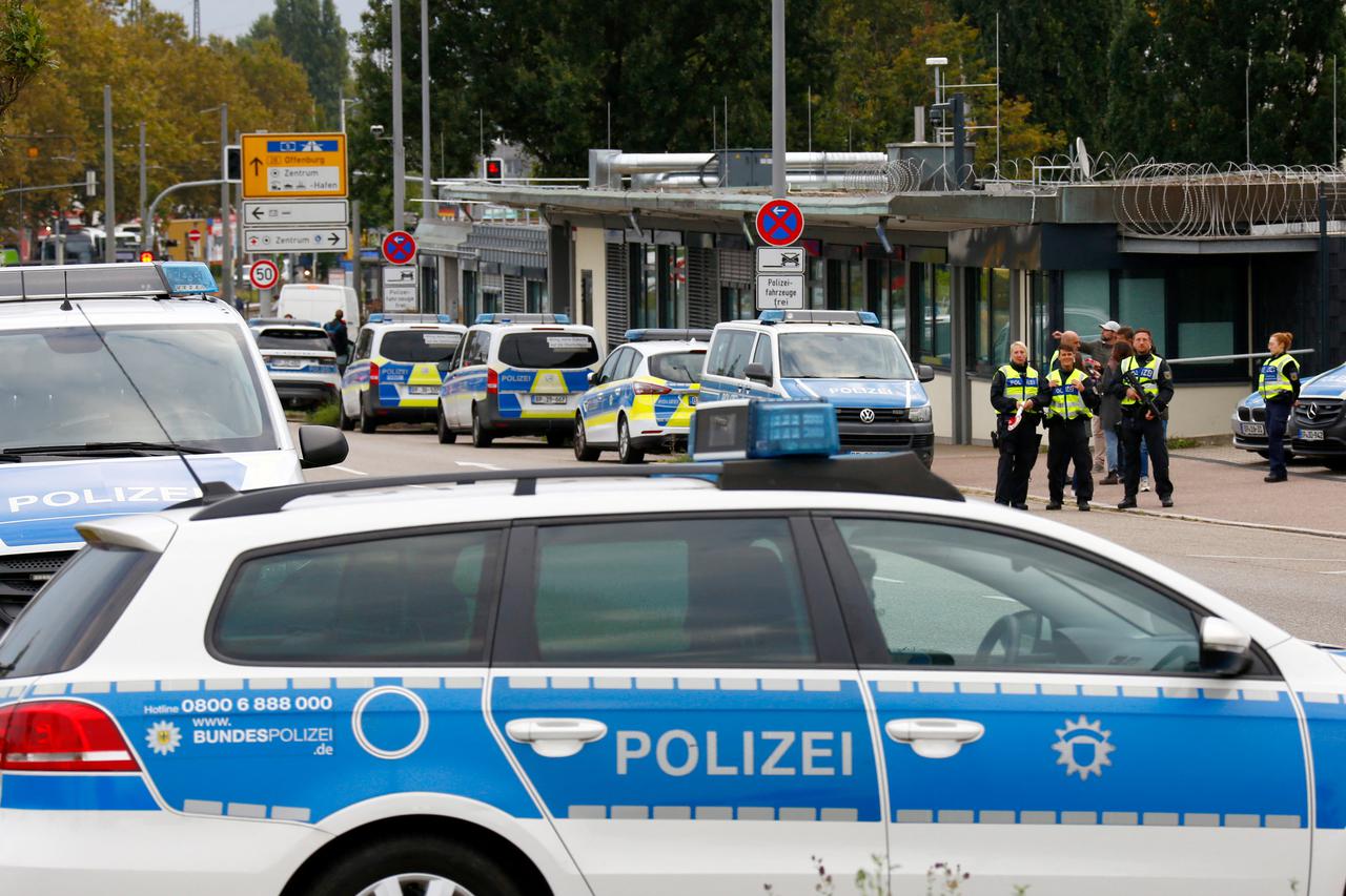 German police officers conduct random checks at a border with France, in Kehl