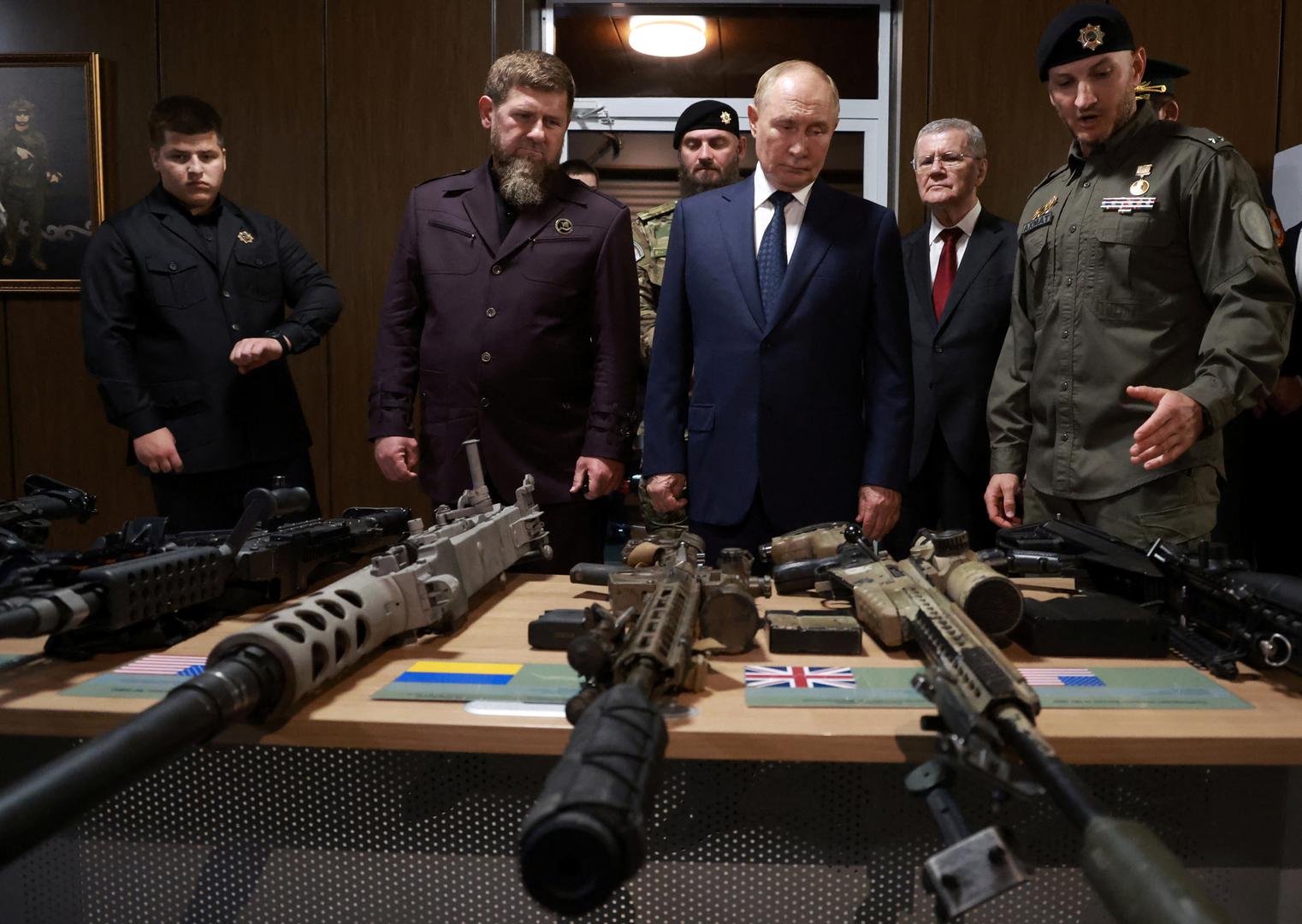 Russia's President Vladimir Putin and head of the Chechen Republic Ramzan Kadyrov look at weapons that were said to be captured during Russia's military campaign in Ukraine, as they visit the Russian Special Forces University in Gudermes, Russia August 20, 2024. Sputnik/Vyacheslav Prokofyev/Pool via REUTERS ATTENTION EDITORS - THIS IMAGE WAS PROVIDED BY A THIRD PARTY. Photo: VYACHESLAV PROKOFYEV/REUTERS