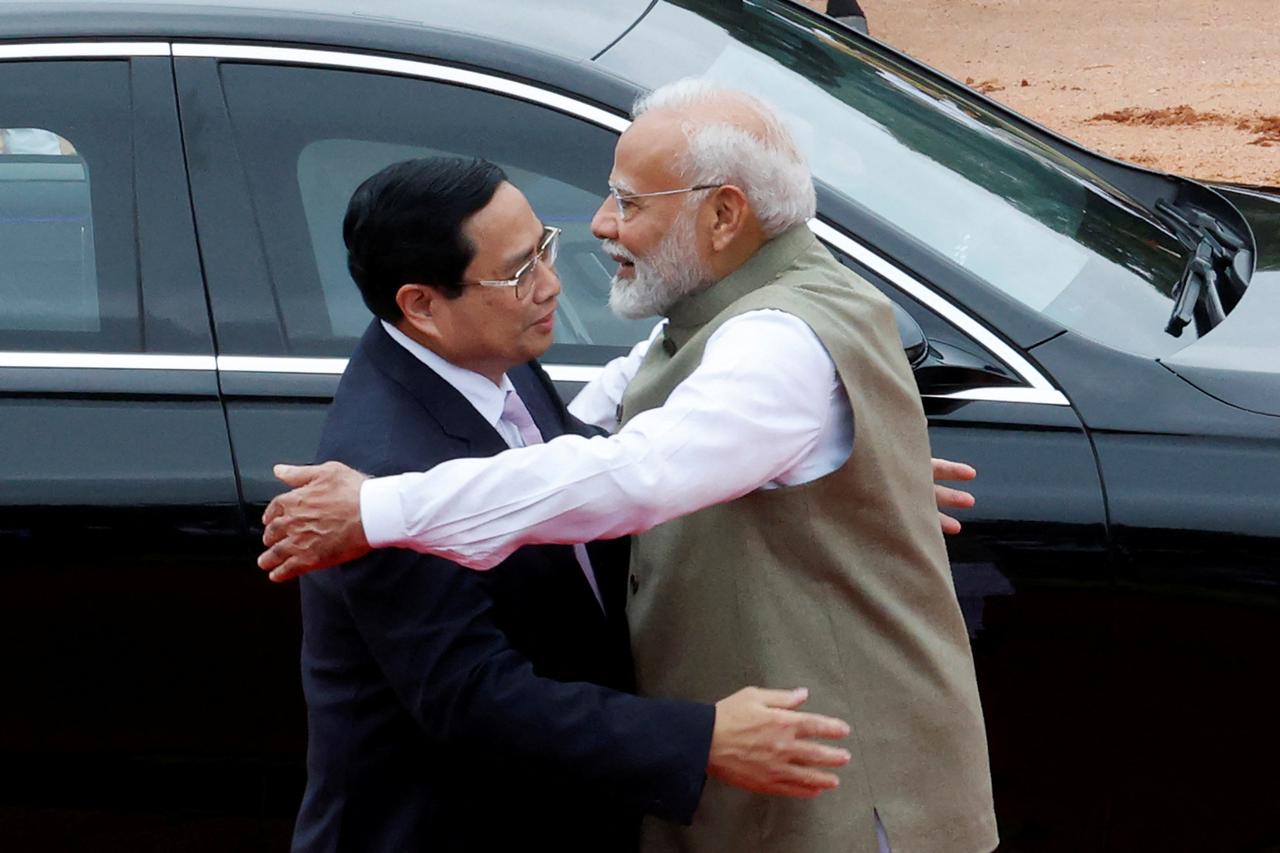 Vietnamese Prime Minister Pham Minh Chinh is greeted by his Indian counterpart Narendra Modi during his ceremonial reception at the forecourt of India's Presidential Palace Rashtrapati Bhavan in New Delhi, India