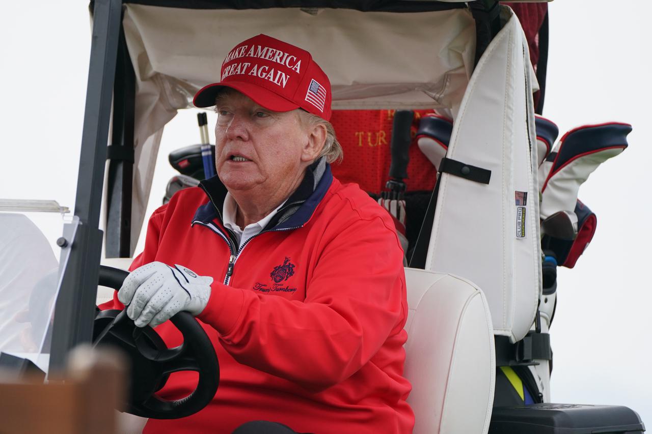 Former US president Donald Trump playing golf at his Trump Turnberry course in South Ayrshire during his visit to the UK