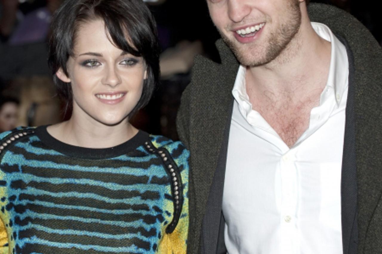 'Taylor Lautner, Kristen Stewart and Robert Pattinson attend the UK Fan Event for The Twilight Saga: New Moon, at the Battersea Evolution , London. Photo: Press Association/Pixsell'