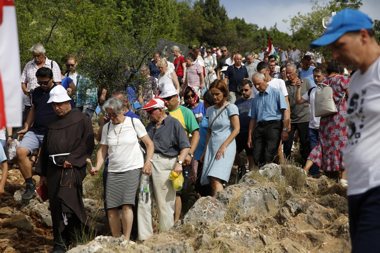 25.06.2021., Medjugorje, Bosna i Hercegovina - Po prvi put u posljednjih 40 godina, procesija koja se odrzava na samu obljetnicu krenula je sa Brda ukazanja, mjesta gdje se Gospa prvi put ukazala. Photo: Denis Kapetanovic/PIXSELL