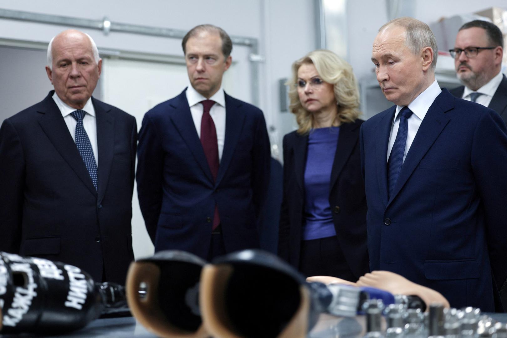 Officials, including Russian President Vladimir Putin, visit the National medical research centre for traumatology and orthopedics on International Day of Persons with Disabilities in Moscow, Russia, December 3, 2024. Sputnik/Gavriil Grigorov/Kremlin via REUTERS ATTENTION EDITORS - THIS IMAGE WAS PROVIDED BY A THIRD PARTY. Photo: Gavriil Grigorov/REUTERS